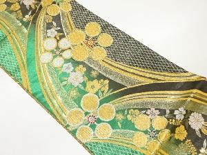 変わり梅に草花・曲線模様織出し袋帯